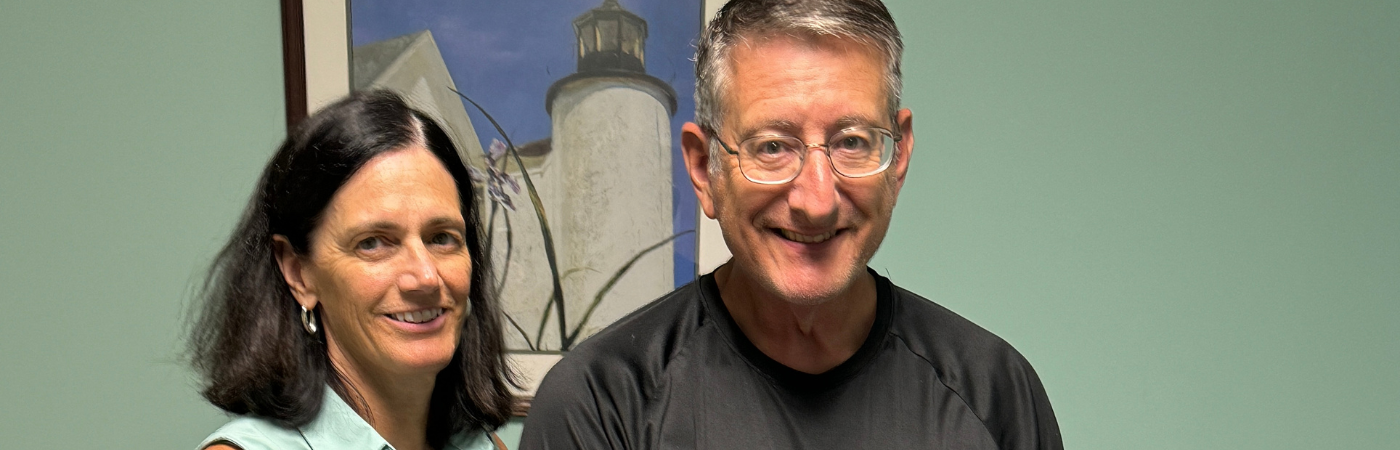 a man and a woman standing next to each other